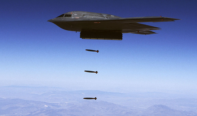 A B-2 drops JDAM bombs during a test at the Utah Testing and Training Range. (US Air Force)